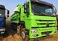 Camión volquete resistente posterior verde del color HOWO operación fácil de 30 metros cúbicos